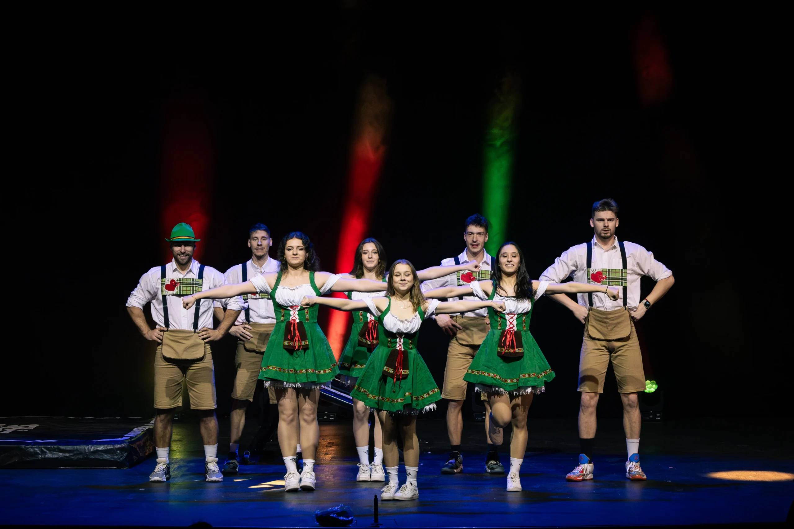 Dunking Devils acrobatic theatre show at Špas Teater: the cast in traditional costumes during a comic scene on stage.